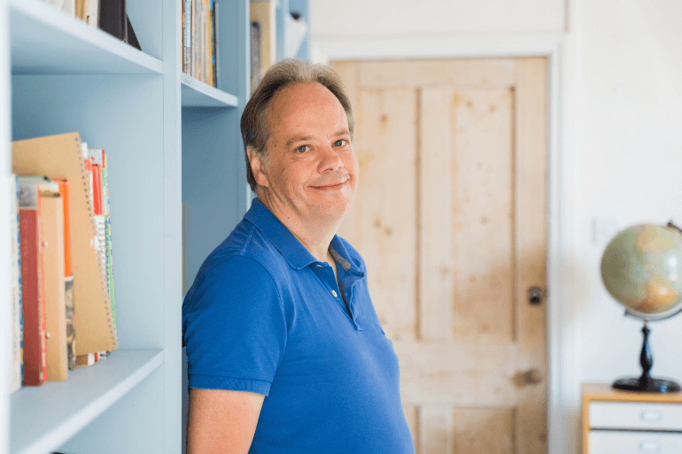 Charles in his office